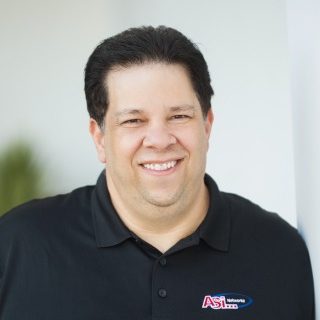 Dean Nedelman from ASi-Networks in black polo shirt